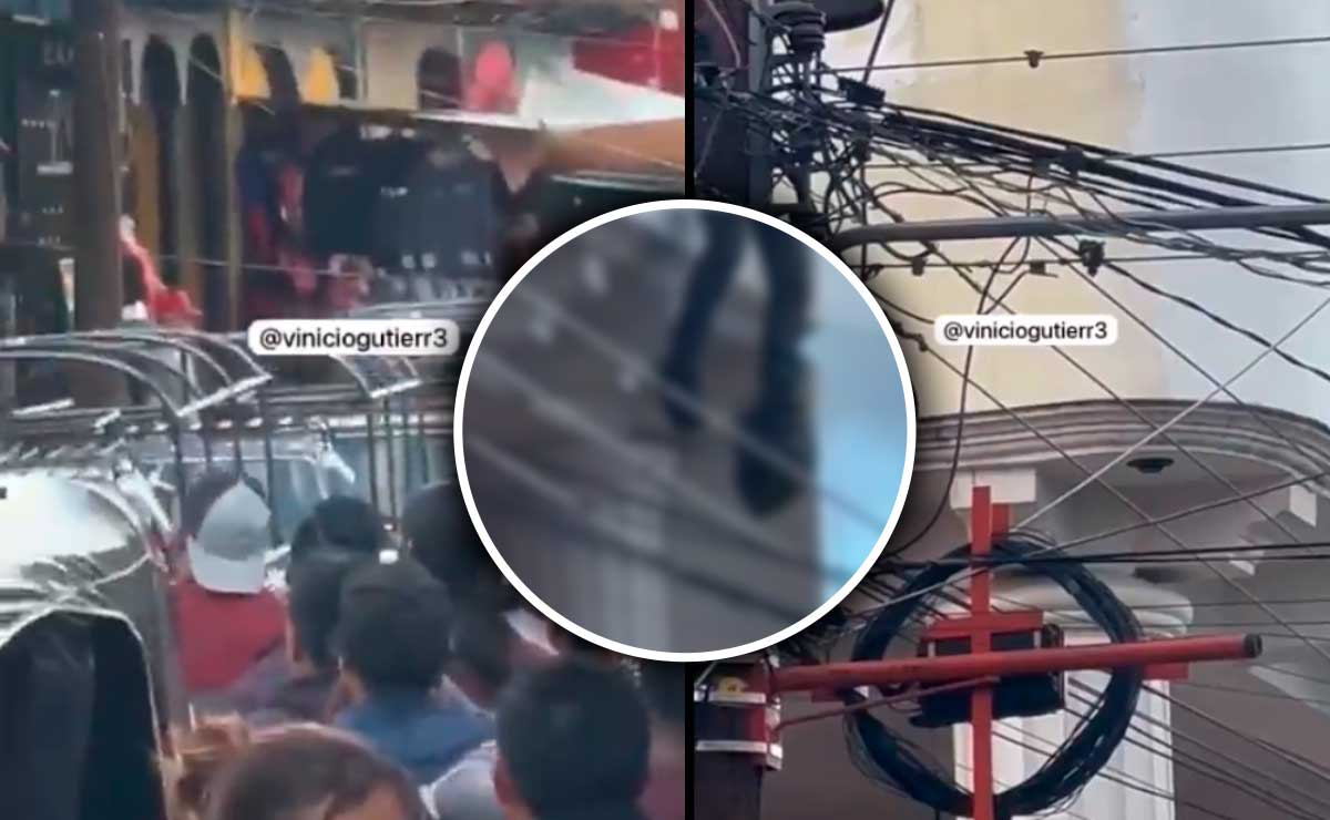 Hombre quedó colgando en una ventana cuando trabajaba (VIDEO)